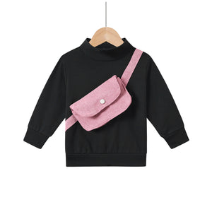 pink fanny pack on black sweat