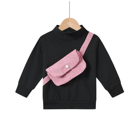 pink fanny pack on black sweat